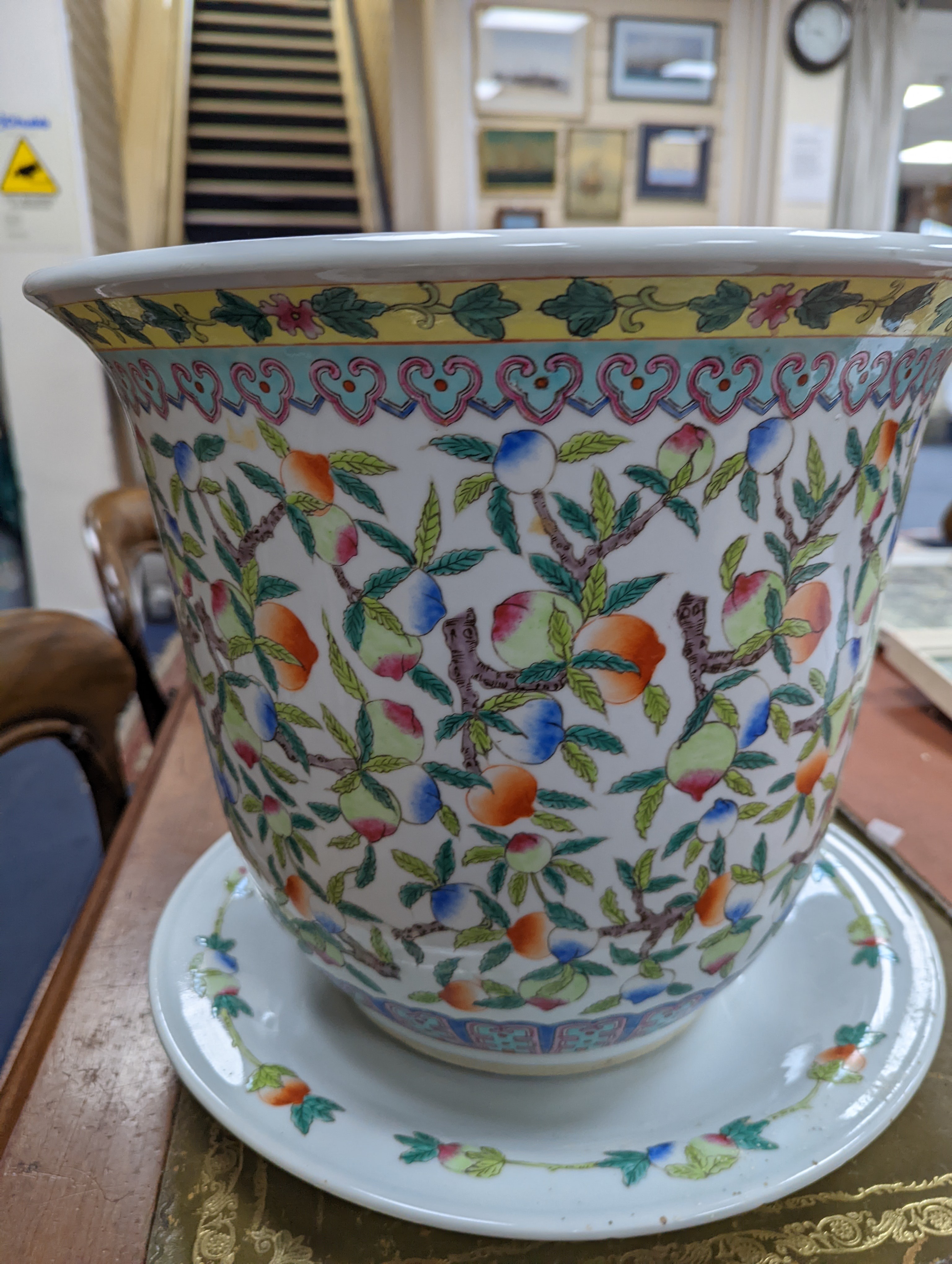 A 20th century Chinese porcelain jardiniere and dish, diameter 36 cms.